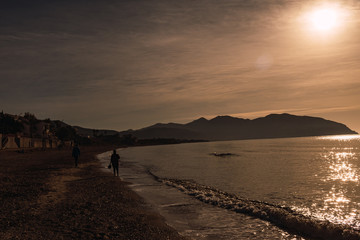 Fototapeta premium Couple walking on a beach