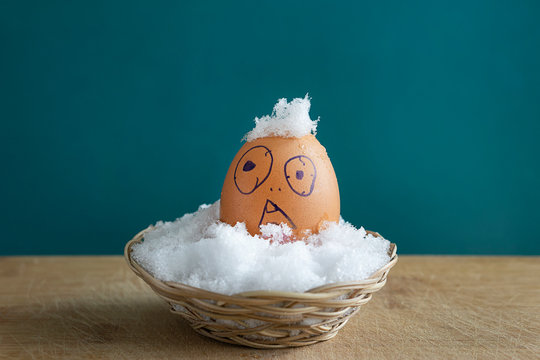 Egg in a basket with snow