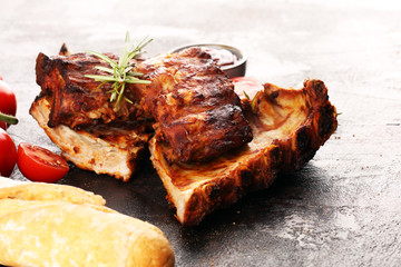 Grilled spare ribs for a tasty bbq meat with hot spicy barbecue sauce