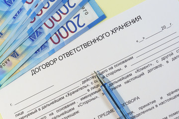 Registration of an agreement on the transfer of valuables for storage. Russian text "the Contract of responsible storage", - ruble bills for payment handle