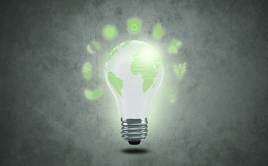 Earth concept with bulb on isolated background