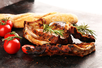 Grilled spare ribs for a tasty bbq meat with hot spicy barbecue sauce