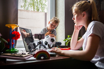 Coronavirus. Quarantine. Online training, distant remot work. Laptop and kid toys on the table. Work from home with children, home office. Workplace at home. Coronavirus pandemic in the world.Covid 19