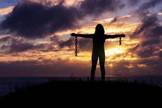 Break free from the chains, Woman with broken chains.