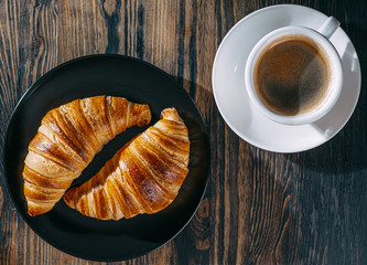 croissant and cup of coffee