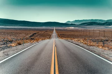 Foto auf Acrylglas Antireflex Lonely Road Through the Isolated Beauty of the California Desert © patsch.1