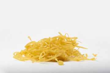 homemade noodles on a white background