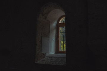 the light falling through a window in an old church