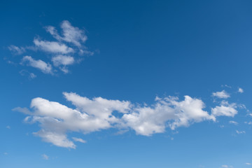 white clouds in the blue sky