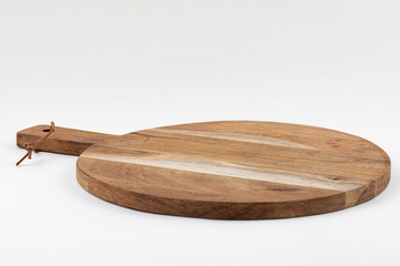 Empty chopping board on white background for kitchen product display