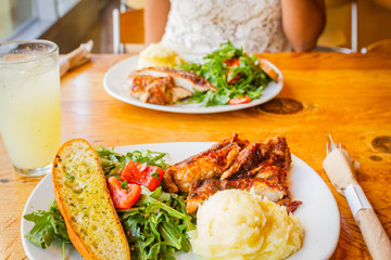 Healthy grilled chicken meal with salad
