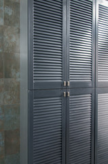 Fototapeta premium Iron shutters of a metal cabinet close-up