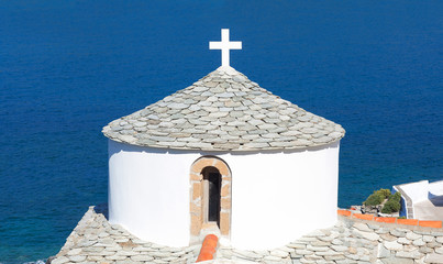 White church of Evangelistria, the Virgin Mary and Panagitsa Tower in Chora Town, the capital of Scopelos island, Northen Sporades, Greece