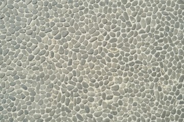 Gray textured stone sea pebbles wall, texture, pattern, background