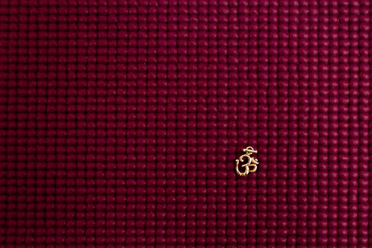 Golden Aum Symbol Yoga Mat