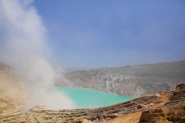 Volcano Ijen. View from above, stunning view of the Ijen volcano with the turquoise-coloured acidic crater lake. The Ijen volcano complex is a group of composite volcanoes located in East Java