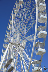 white Ferris wheel on the blue sky