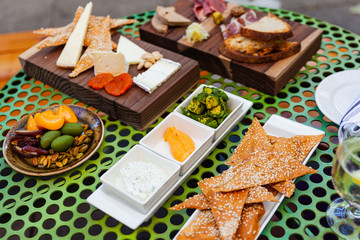 appetizer board with cheese and bread