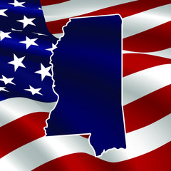 United States, Mississippi. Dark blue silhouette of the state on its borders on the background of the USA flag.
