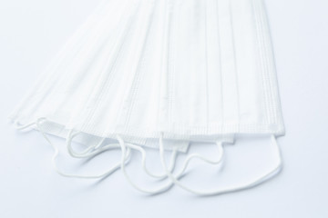 Several protective medical masks on a white background personal protective Equipment
