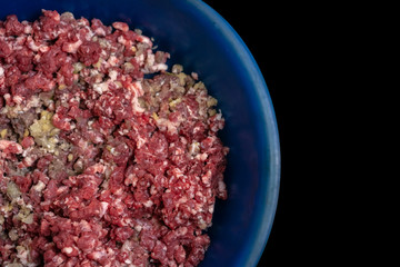 The minced meat lies in the dishes