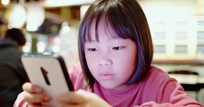Asian girl use cell phone