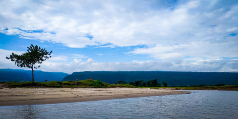 A beautiful landscape photo of hills and river