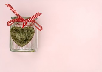 ornate heart red bow and glass jar view from above - obrazy, fototapety, plakaty