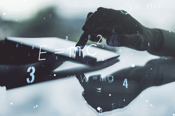 Creative scientific formula illustration with finger presses on a digital tablet on background, science and research concept. Multiexposure