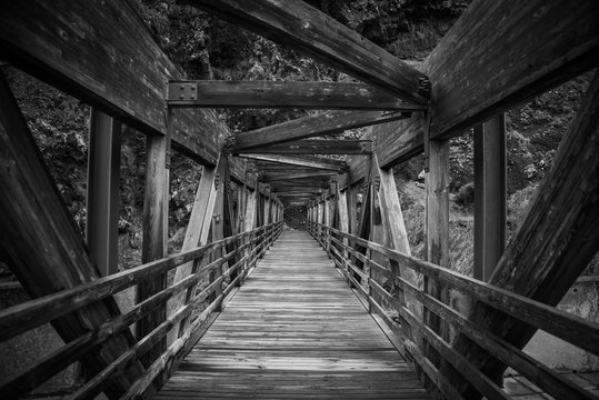 Old wooden bridge in black and white. Selective focus. Sao Vicente, Madeira Island. 