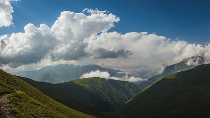 Fototapeta premium Wonderful view from Khidotani ridge in Khevsureti national park in georgian Caucasus. Omalo Shatili trek.
