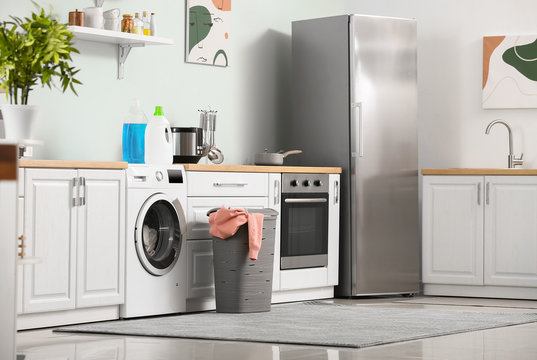 Interior Of Kitchen With Modern Washing Machine