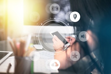 Human hands working on a modern smartphone