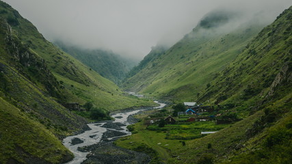 View on Khonischala village in Georgia. In valley of Khonistskali river. Omalo Shatili trek.