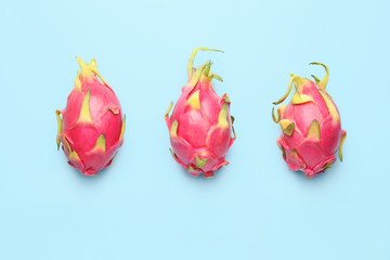 Tasty dragon fruit on color background