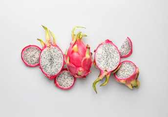 Tasty dragon fruit on grey background