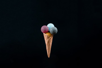 colored balls with cone and ice cream appearance