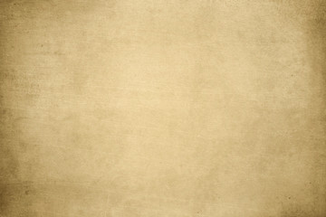Aged texture of old vintage brown paper, can be use as abstract background, wallpaper,  webpage, copy space for text.