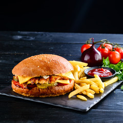 set of burgers with French fries