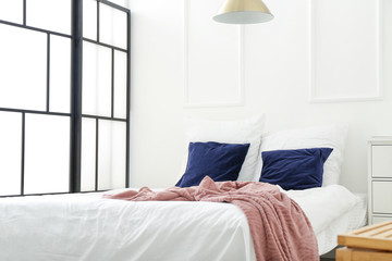 Interior of modern comfortable bedroom
