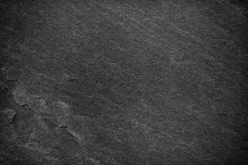 Dark grey black slate background or texture.