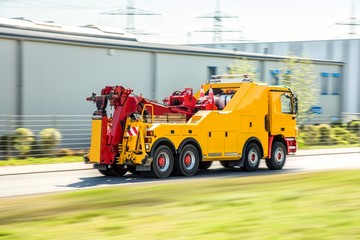 Naklejka premium Road Assistance Service. yellow tow truck . transport of evacuation of cars