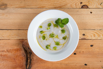 yam broth on a wooden table. top view.