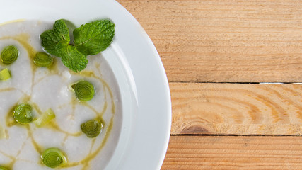 yam broth on a wooden table. top view.
