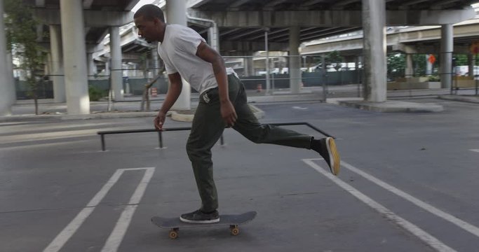 African American skateboarder at skate park