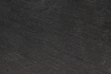 Dark grey black slate background or texture.