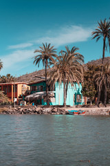 Colorful buildings in the Mulege. Baja California Sur. Mexico. Old lamp.