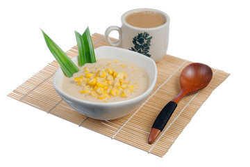 Corn porridge  in white bowl and a cup of coffee  isolated on white background