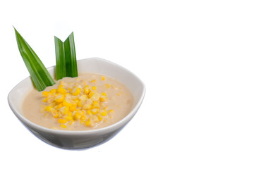 Corn porridge  in white bowl isolated on white background