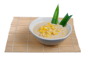 Corn porridge  in white bowl isolated on white background